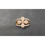 Gemporia - A 9ct gold Argyle diamond Tomas Rae ring, set with round cut diamonds totalling 1.