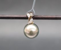 Gemporia - A 9ct gold cultured pearl and diamond pendant, set with round pearl and diamonds,