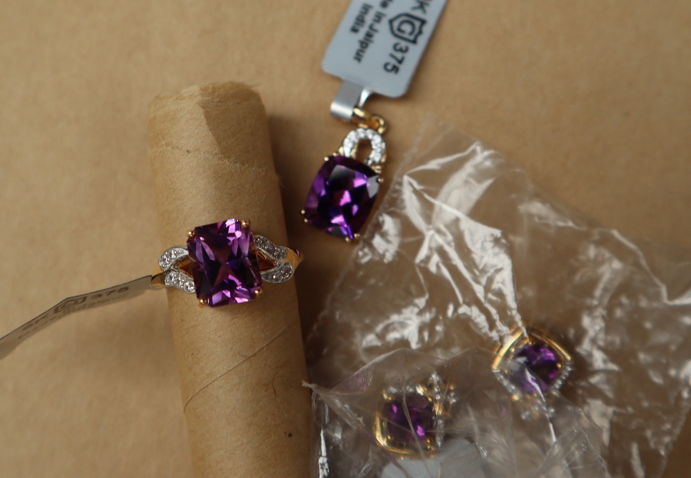 Gemporia - A 9ct gold amethyst and white zircon pendant, set with a 3.