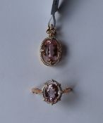 Gemporia - A 9ct gold kolum kunzite and diamond pendant,