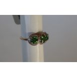 Gemporia - A 9ct gold Tsavorite Garnet and white zircon ring,