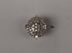 Gemporia - A 9ct white gold Tomas Rae diamond ring, set with round cut diamonds totalling 1ct,