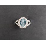 Gemporia - A 9ct white gold Tomas Rae blue and white diamond ring,