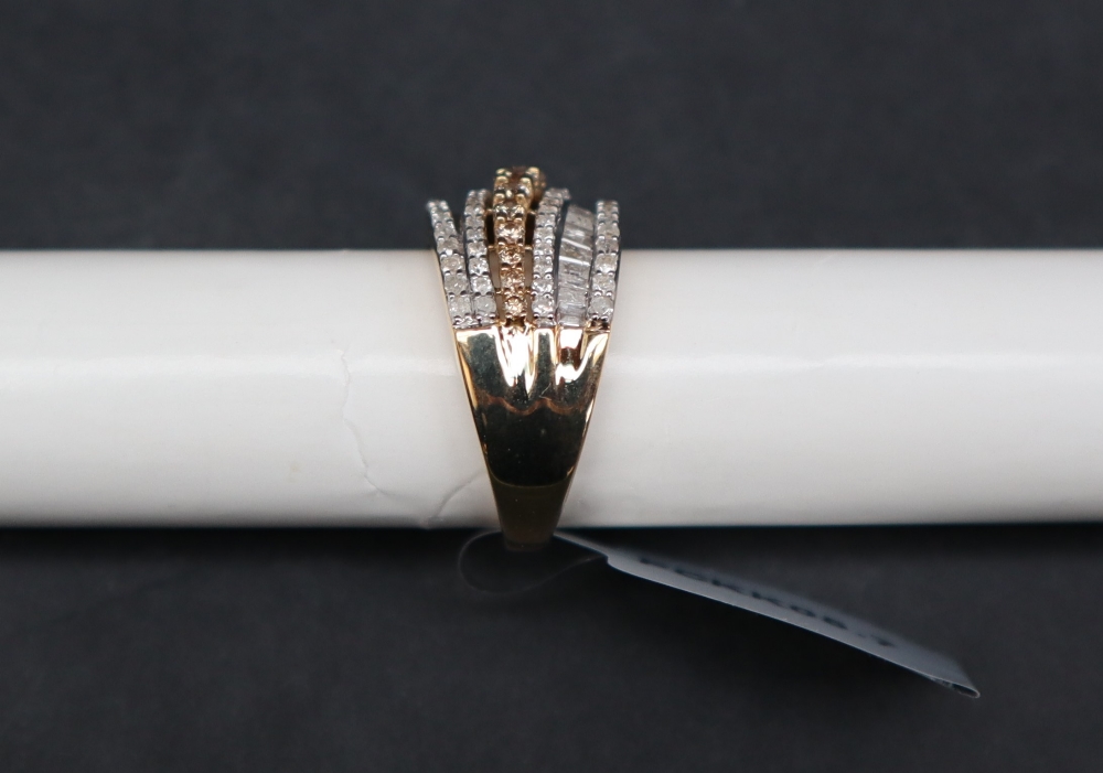 Gemporia - A 9ct gold diamond ring, set with round and tapered baguette cut diamonds totalling 1. - Image 2 of 5