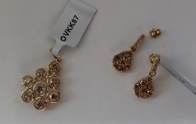 Gemporia - A pair of 9ct gold Tomas Rae diamond earrings, set with round cut diamonds totalling 1.