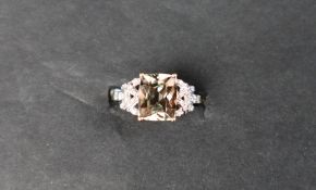 Gemporia - An 18ct gold csarite and diamond ring,