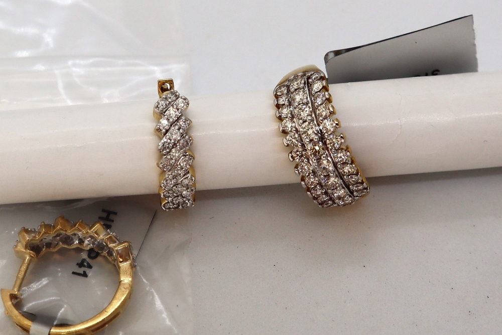 Gemporia - A pair of 9ct gold Tomas Rae diamond earrings,