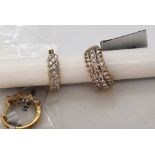 Gemporia - A pair of 9ct gold Tomas Rae diamond earrings,