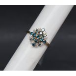 Gemporia - A 9ct gold blue and white diamond ring,