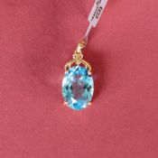 Gemporia - A 9ct gold blue topaz pendant,