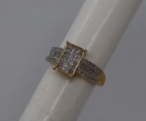 Gemporia - A 9ct gold Tomas Rae diamond ring, set with baguette,