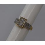 Gemporia - A 9ct gold Tomas Rae diamond ring, set with baguette,