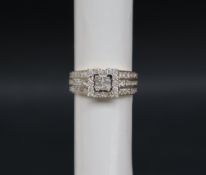 Gemporia - A 9ct gold Tomas Rae diamond ring, set with square and round cut diamonds totalling 1ct,
