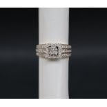 Gemporia - A 9ct gold Tomas Rae diamond ring, set with square and round cut diamonds totalling 1ct,