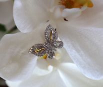 Gemporia - A 9ct gold Tomas Rae butterfly design diamond ring,