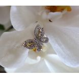 Gemporia - A 9ct gold Tomas Rae butterfly design diamond ring,