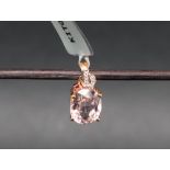 Gemporia - A 9ct gold kolum kunzite and white zircon pendant, set with kunzite,