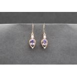 Gemporia - A pair of 9ct gold tanzanite and diamond earrings,