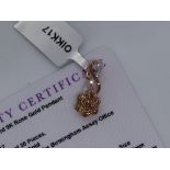 Gemporia - A 9ct rose gold diamond pendant, set with round cut diamonds totalling 3/4ct,