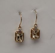 Gemporia - A pair of 9ct gold sunstone and white zircon earrings,