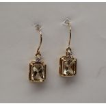 Gemporia - A pair of 9ct gold sunstone and white zircon earrings,