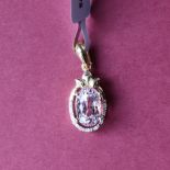 Gemporia - A 9ct gold kunzite and diamond pendant,
