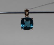 Gemporia - A 9ct gold blue topaz pendant,