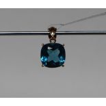 Gemporia - A 9ct gold blue topaz pendant,