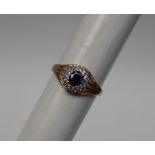 Gemporia - A 9ct gold sapphire and white zircon ring,