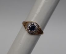 Gemporia - A 9ct gold sapphire and white zircon ring,