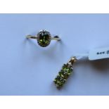 Gemporia - A 9ct demantoid garnet and diamond pendant,