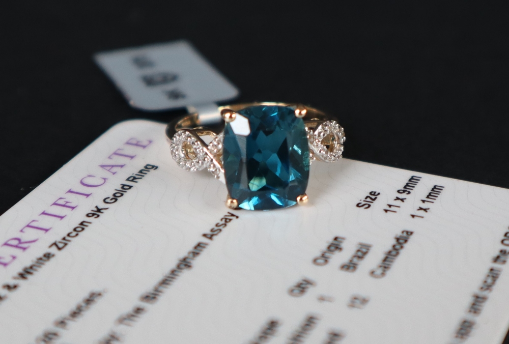 Gemporia - A 9ct blue topaz and white zircon ring, - Image 6 of 7