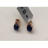 Gemporia - A pair of 9ct Nilamani and diamond earrings,
