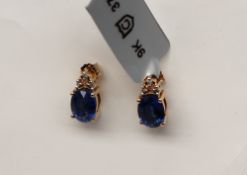 Gemporia - A pair of 9ct Nilamani and diamond earrings,