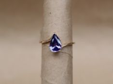 Gemporia - A 9ct gold tanzanite ring, set with pear shaped tanzanite to a 9ct gold setting,