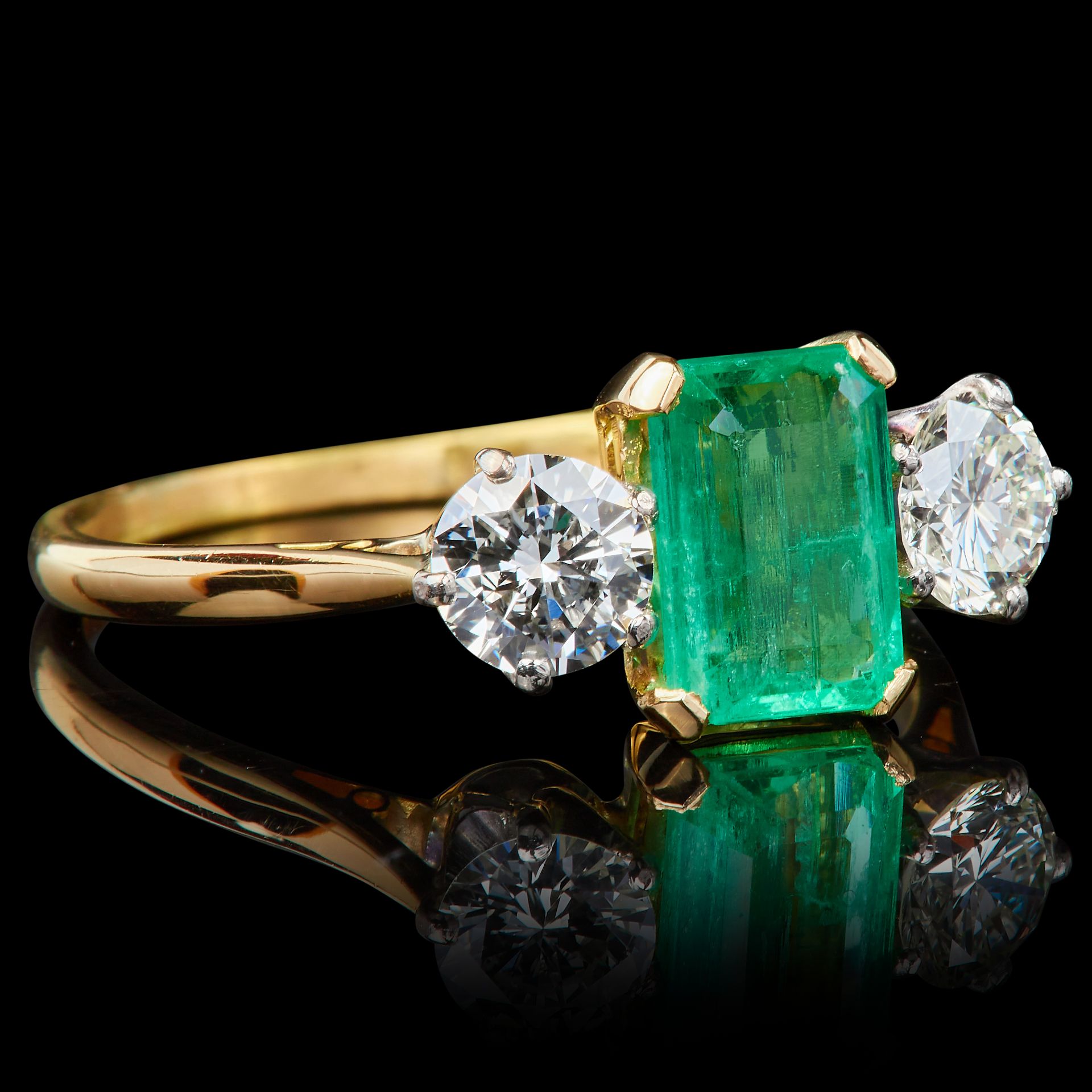 EMERALD AND DIAMOND 3-STONE RING