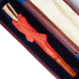 NO RESERVE, 19th CENTURY CORAL AND GOLD CIGARETTE HOLDER