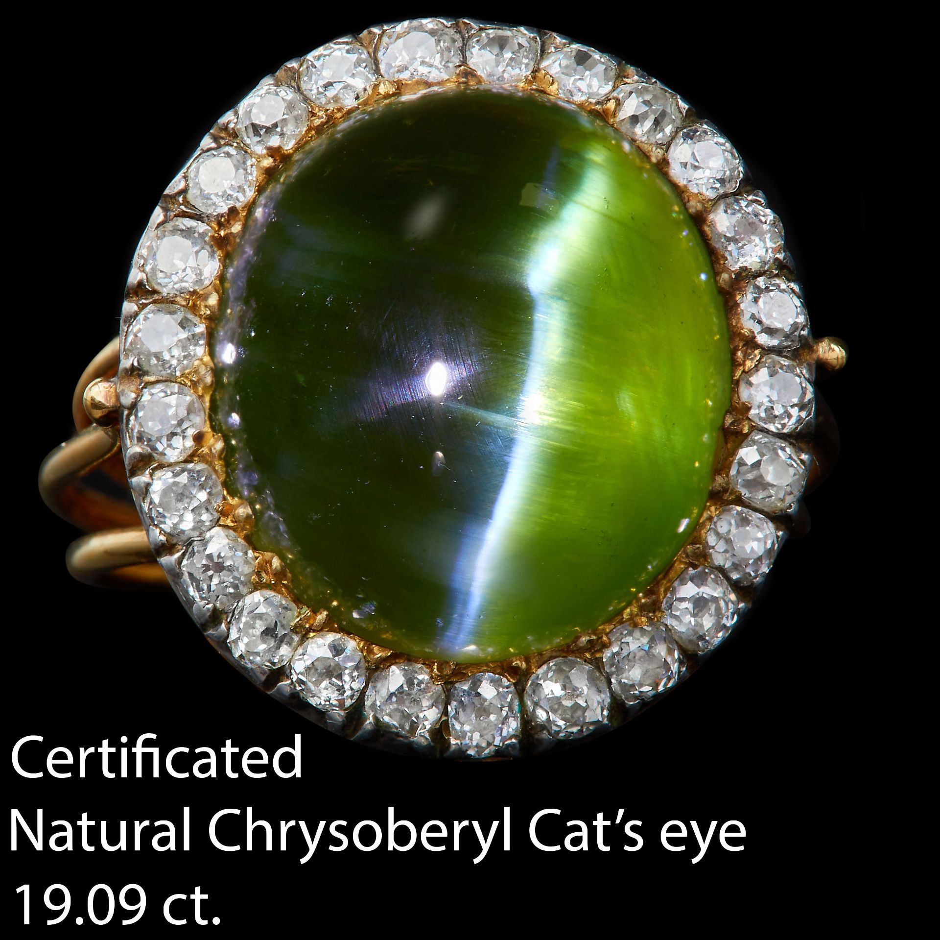 IMPORTANT CERTIFICATED CAT'S EYE AND DIAMOND CLUSTER RING