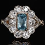 AQUAMARINE AND DIAMOND CLUSTER RING.