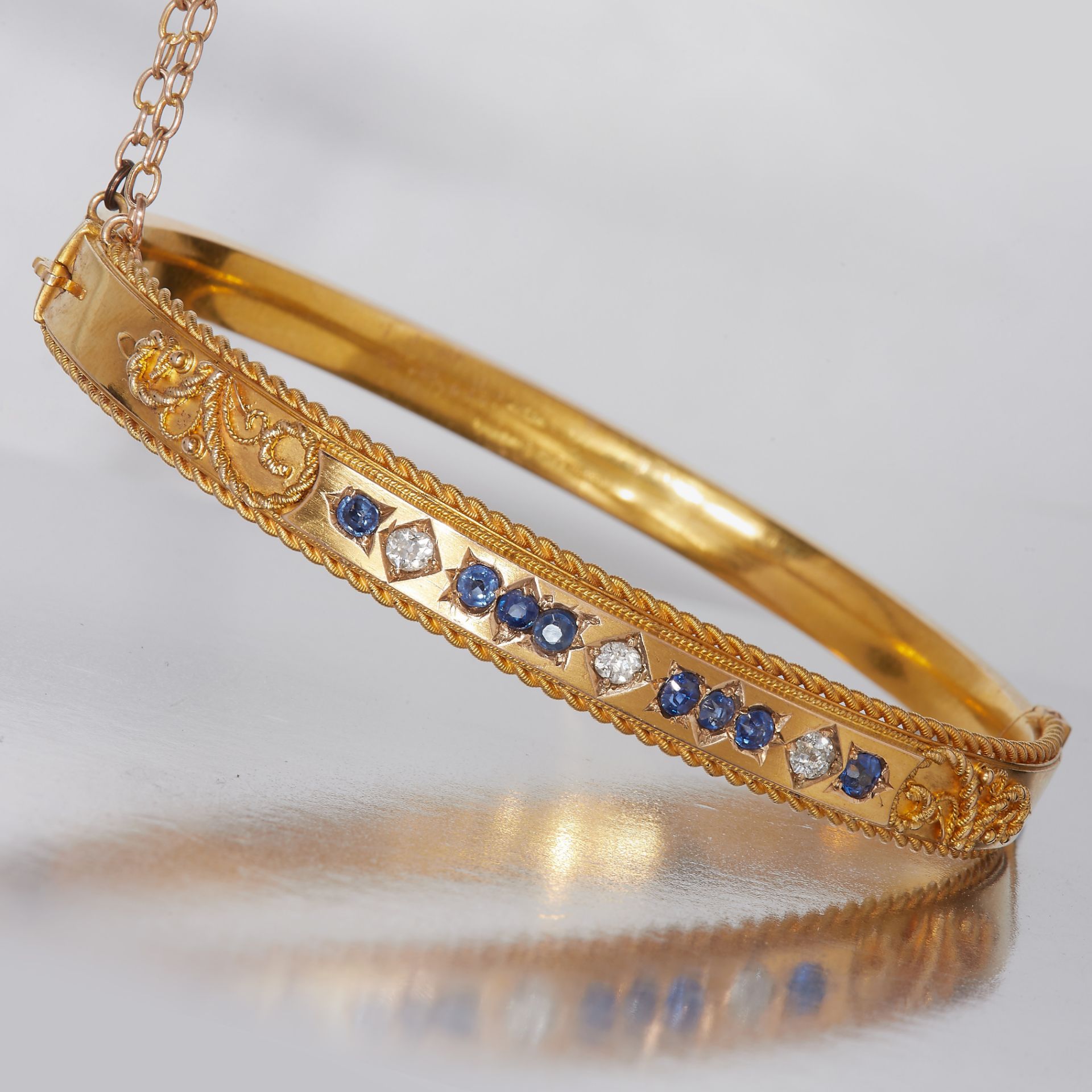 SAPPHIRE AND DIAMOND HINGED BANGLE