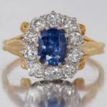 SAPPHIRE AND DIAMOND CLUSTER RING.