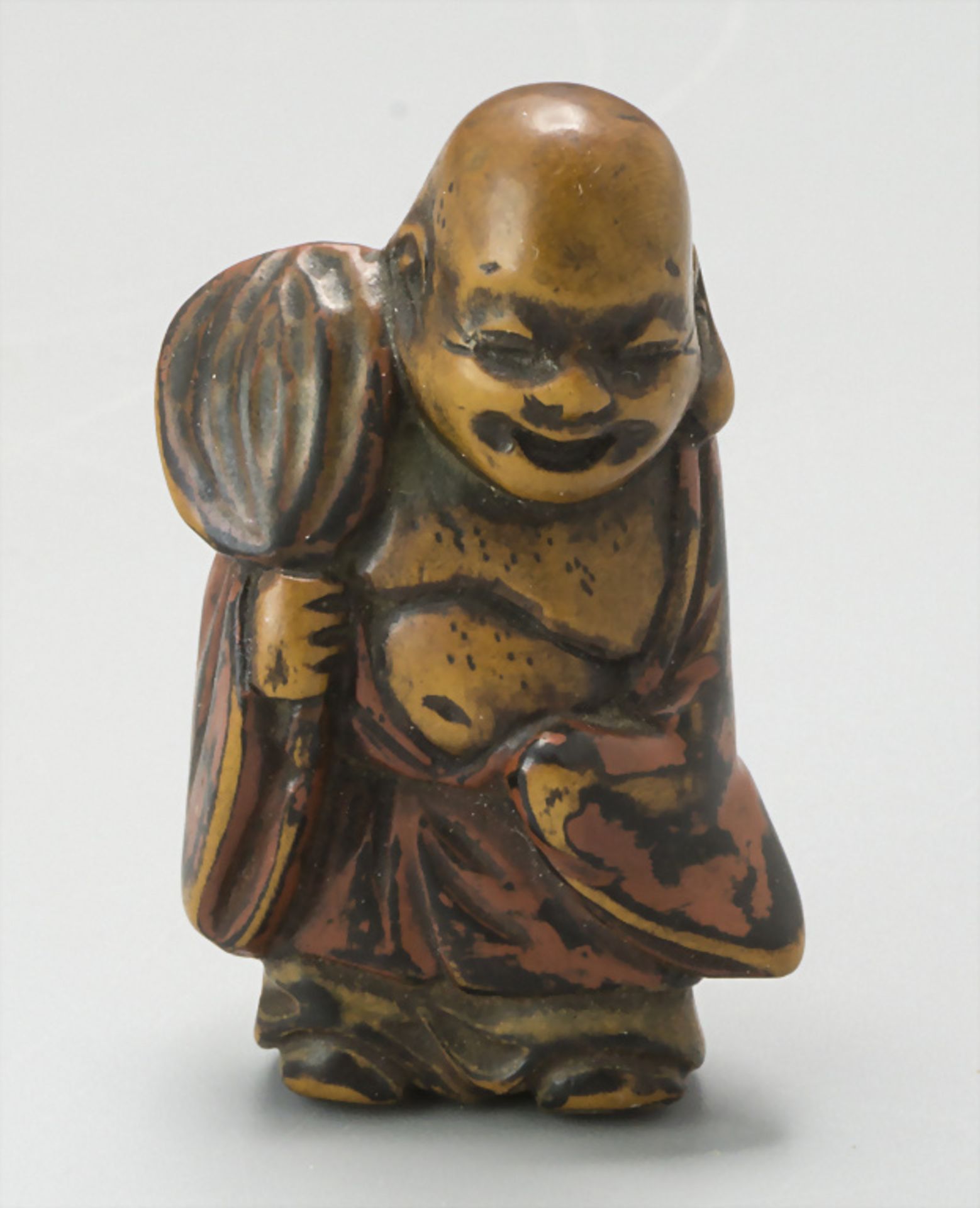 Netsuke Hotei / A lucky god with fan, Japan, 18./19. Jh.