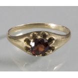 Damenring / A ladies 14ct gold ring with a ruby, um 1900