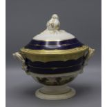 Creamware Saucenterrine / A fine faience cobalt and gilt sauce tureen with landscapes, wohl ...