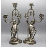 Paar figürliche versilberte Bronzeleuchter / Paire de bourgeoirs en bronze argenté / A pair of ...