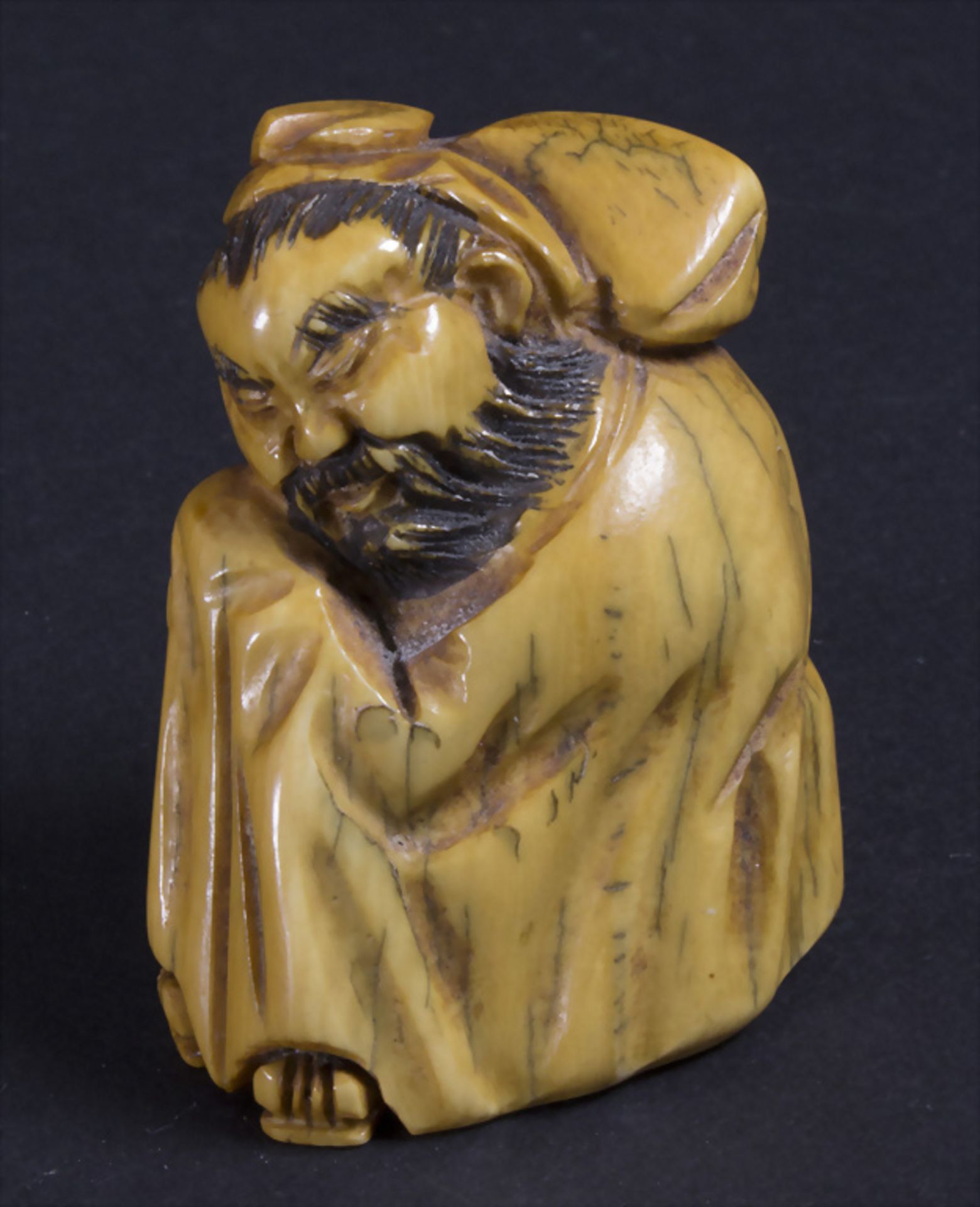 Netsuke 'Sitzender Gelehrter' / A sitting scholar, Japan, 18./19. Jh.