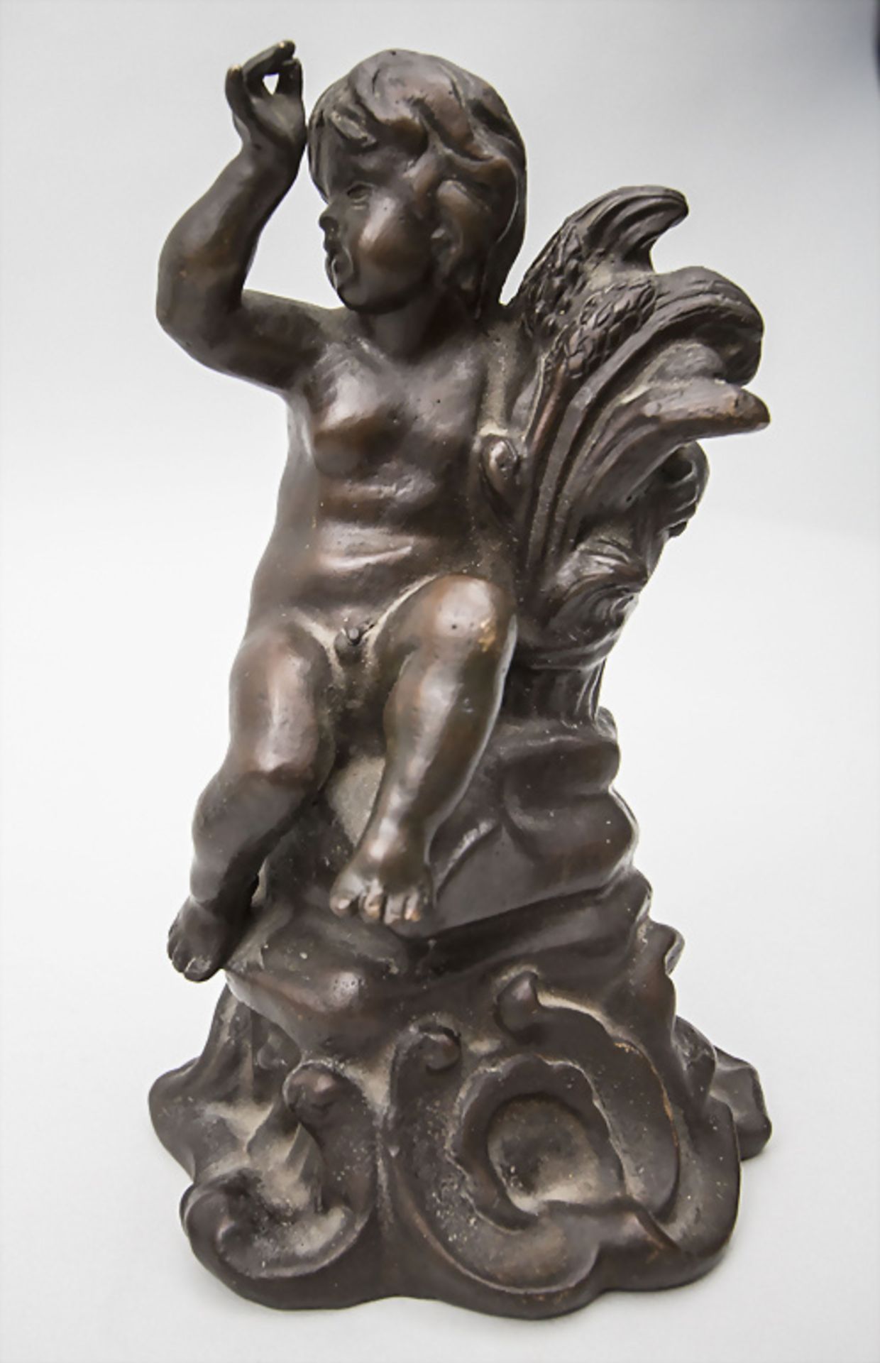Bronzefigur 'Rokoko-Putto' / A bronze figure of a Rococo putto, 19./20. Jh.