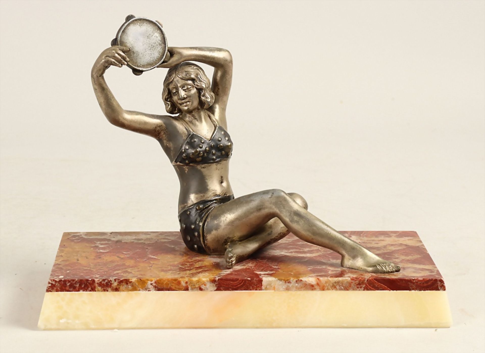 Art Déco Skulpture Tänzerin mit Tambourin / An Art Deco sculpture of a female dancer with a ...