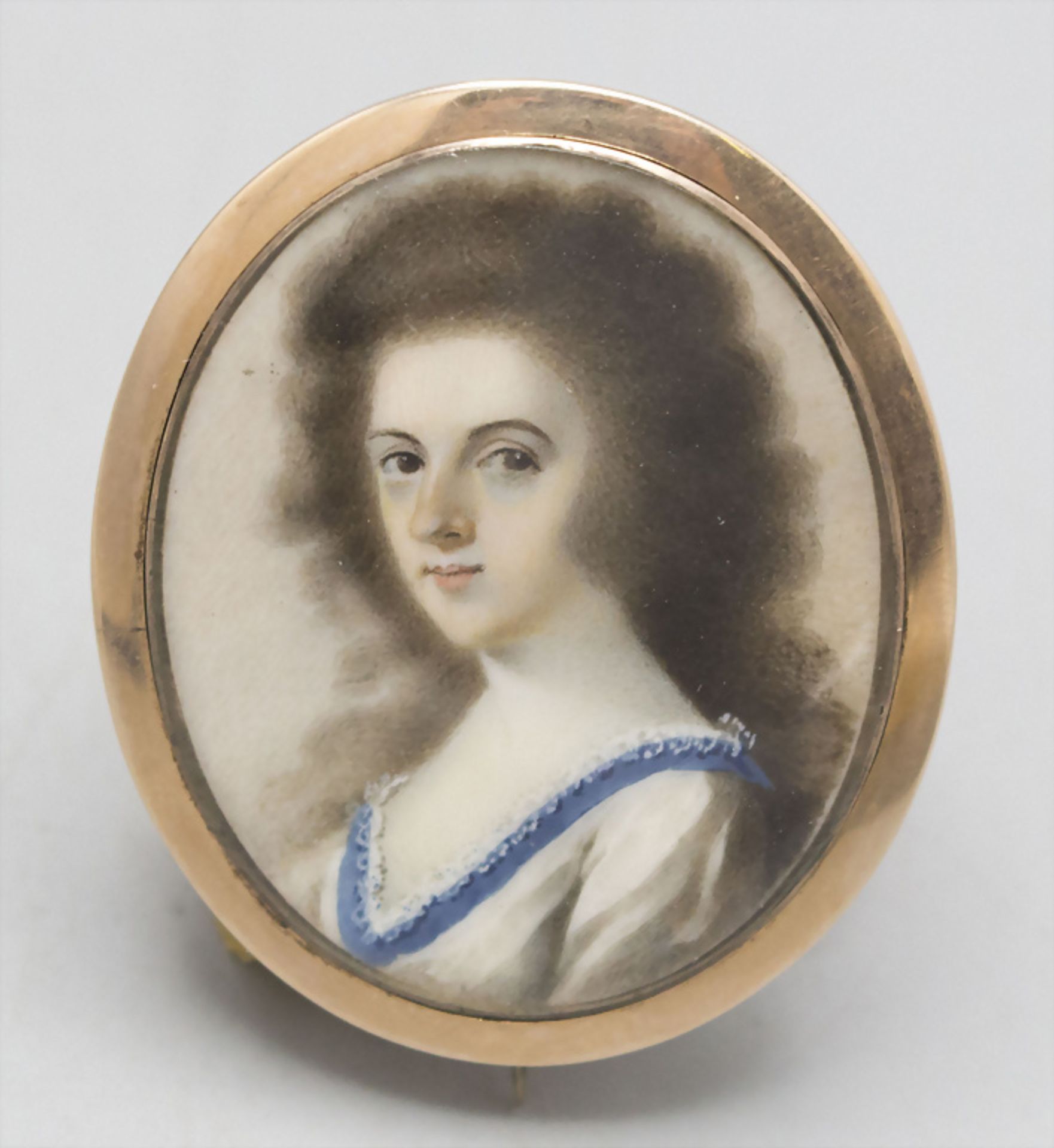 Miniature einer Dame / A miniature portrait of a lady in an 8ct gold frame, 19. Jh.