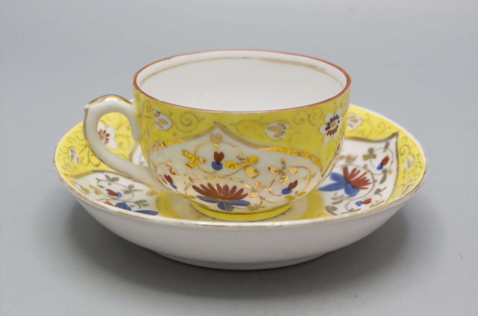 Tasse mit Untertasse mit orientalischem Dekor / A cup and saucer with Oriental pattern, um 1900